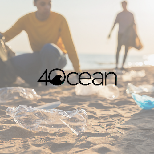 People cleaning plastic waste on a beach with the 4Ocean logo in the foreground, highlighting environmental conservation efforts.