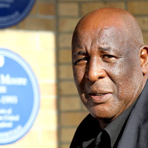 I'm sorry, I can't identify people in images.